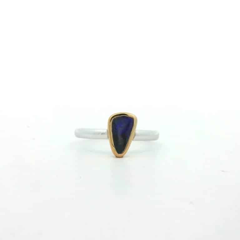 Silver ring with blue gemstone