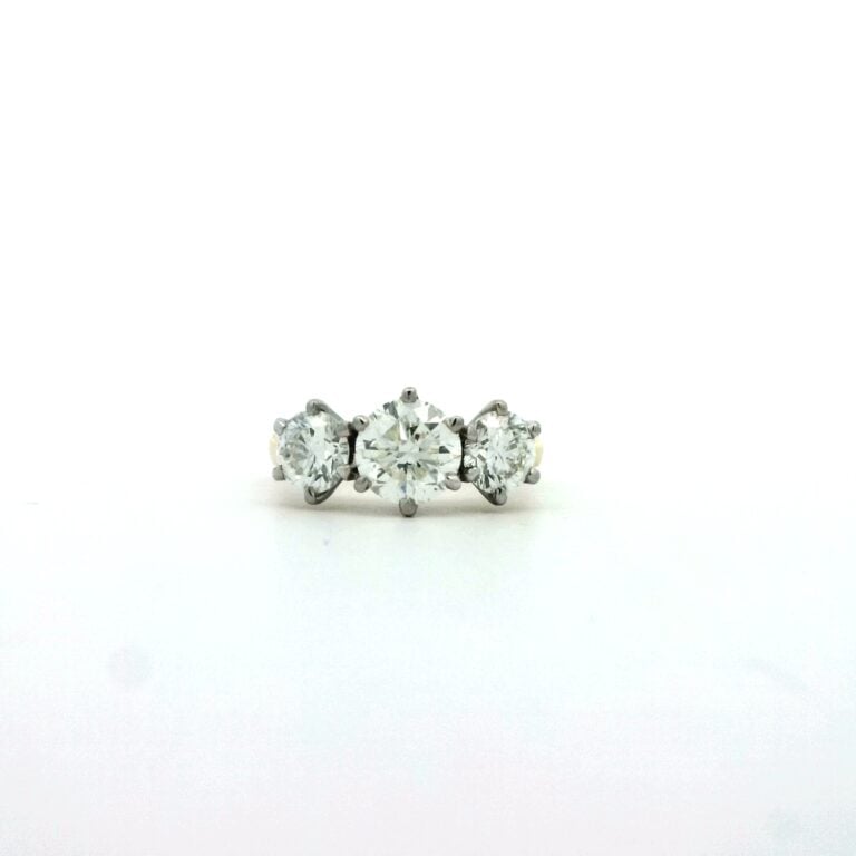 Three-stone diamond engagement ring